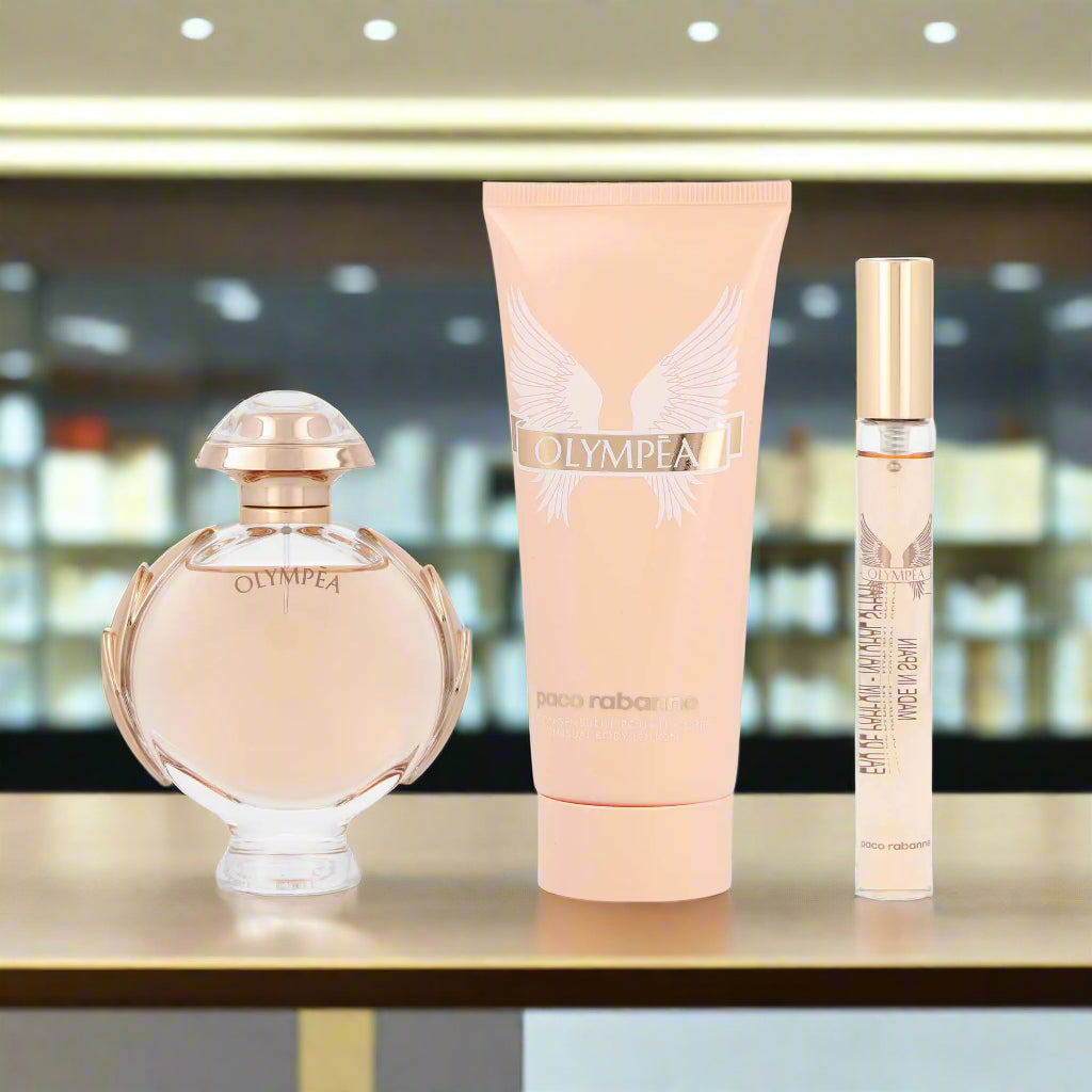 Olympea perfume set by Paco Rabanne on a white background - Elixir Haute