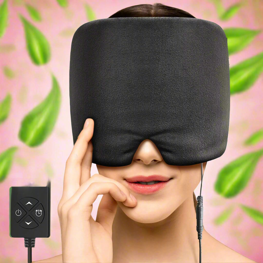 Person wearing a black eye mask with a digital controller on a white background